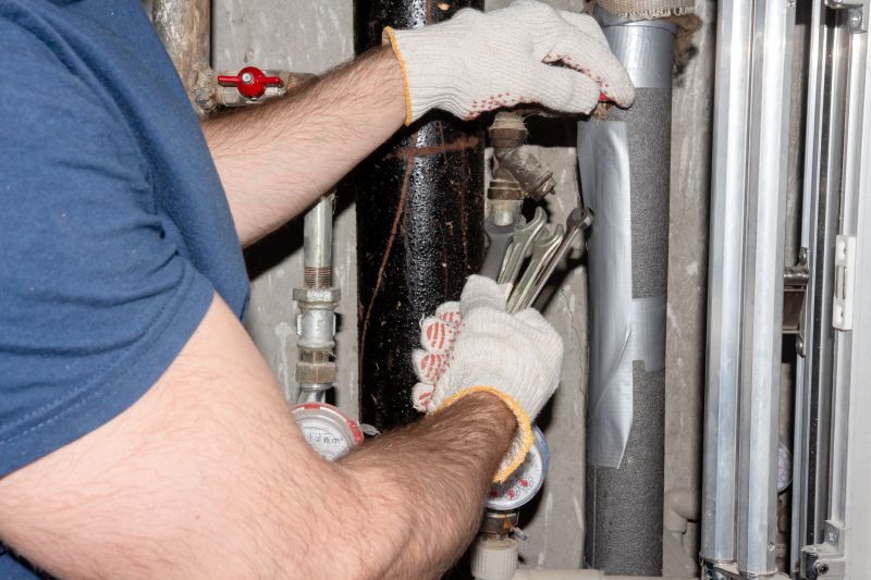 Plumber Sealing a Pipe